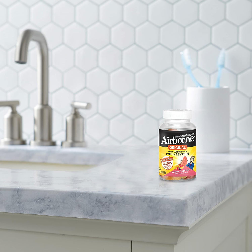 Airborne Vitamin C 750mg (per Serving) Assorted Fruit Flavored Gummies (42 Count in a Bottle), Gluten-Free Immune Support Supplement with Vitamins A C E, Selenium, Echinacea & Ginger